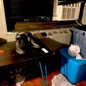 All black high top puma sneakers